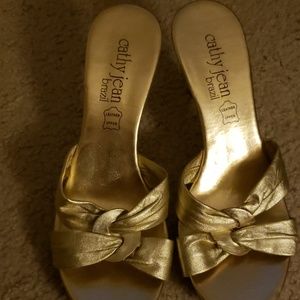 Gold backless heels